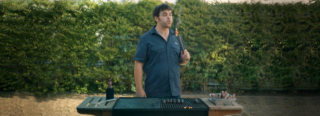 A man using a barbecue