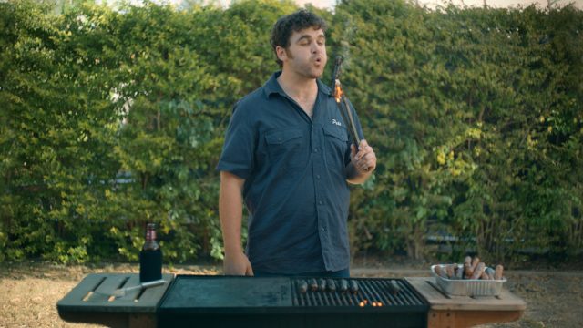 A man using a barbecue