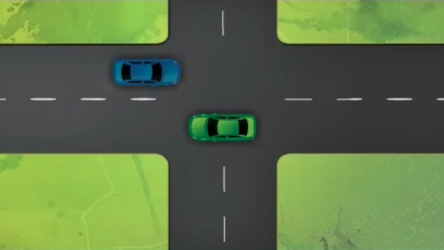 Two animated cars approaching an intersection