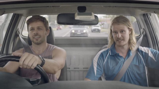 Two young men in a car