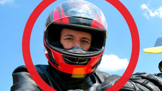 A motorcycle rider with his face circled red