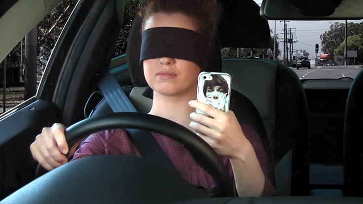 Woman drives blindfolded to demonstrate the dangers of going on your phone while driving