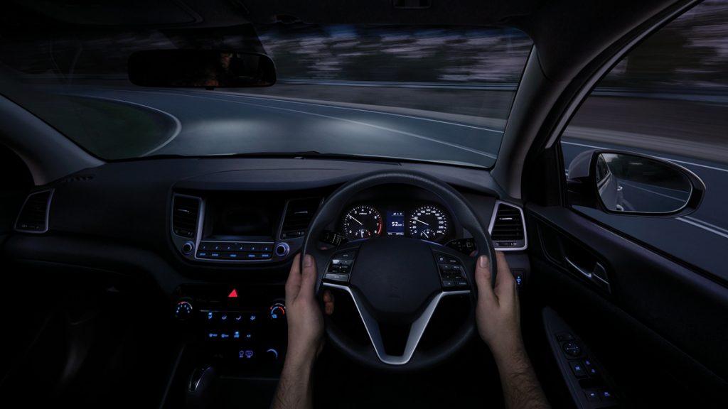 Driver's side view from the vehicle onto the road