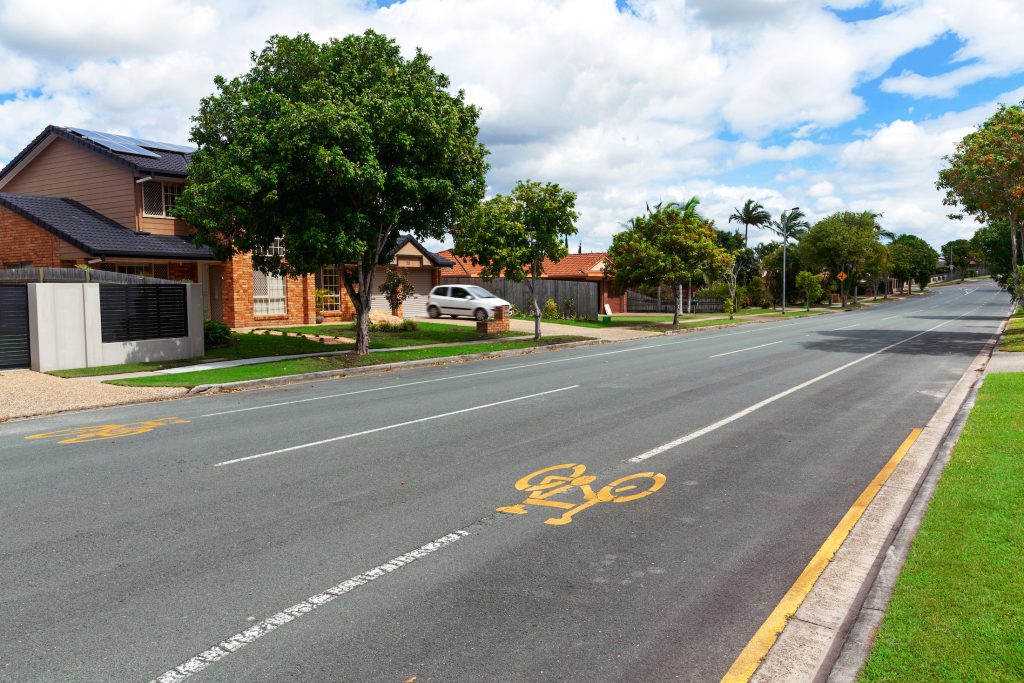 Road with a bike lane in a suburban residential street