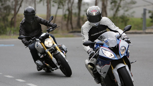 Two motorbike riders cornering