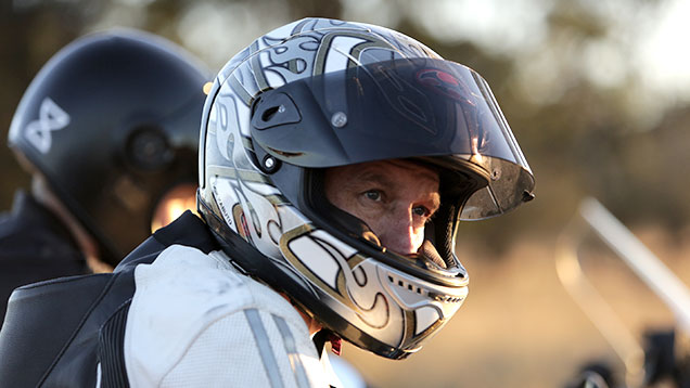 Close up of motorbike rider in helmet