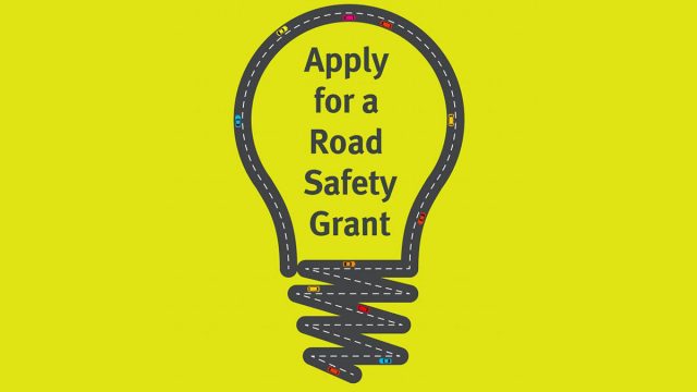 Lightbulb that says 'Apply for a Road Safety Grant'